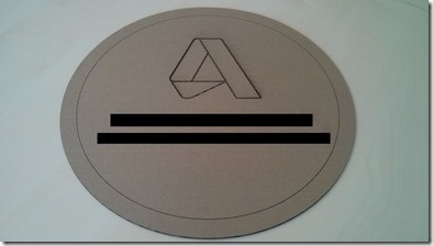 The cardboard prototype with words redacted