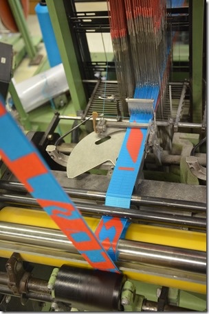 A strap being woven