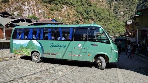 One of the buses taking people up to Machu Picchu from Aguas Calientes