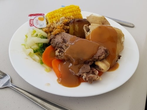 A geothermally cooked meal