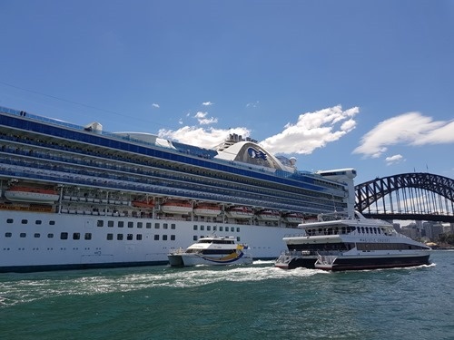 Heading out on the ferry past the Golden Princess