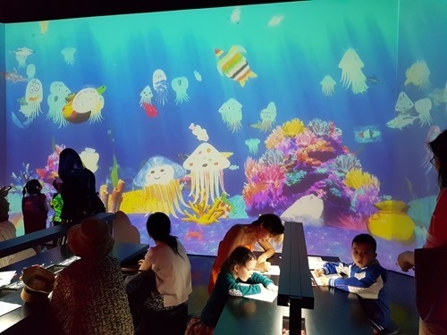 An underwater world containing scanned objects