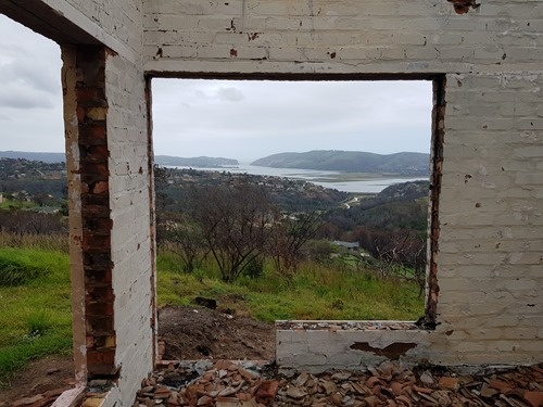 View across the Heads from a burned home