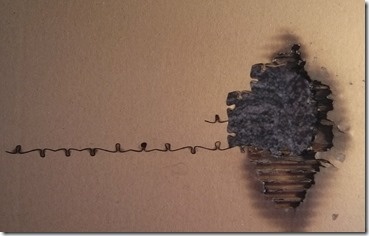 The other side, showing the mark of fire