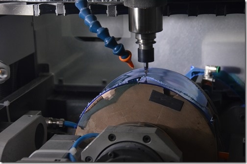 A lens being milled
