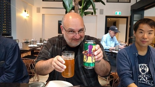 Azam drinking OCTO beer