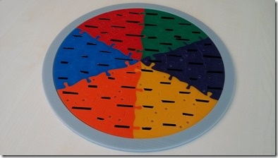 With the jigsaw in it and the words redacted