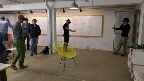 Three people trying HoloLens