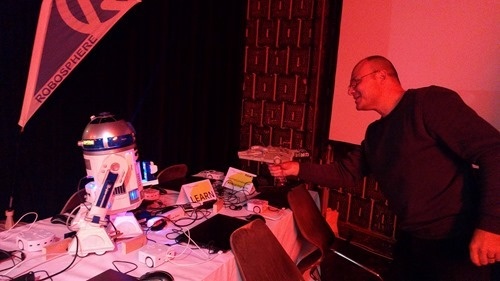 Serge from Robosphere using the Millenium Falcon to turn off R2-D2