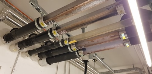 Black, grey and yellow water pipes