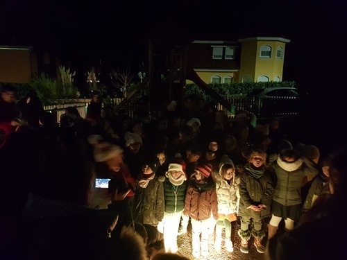 Singing some songs to attract St Nick