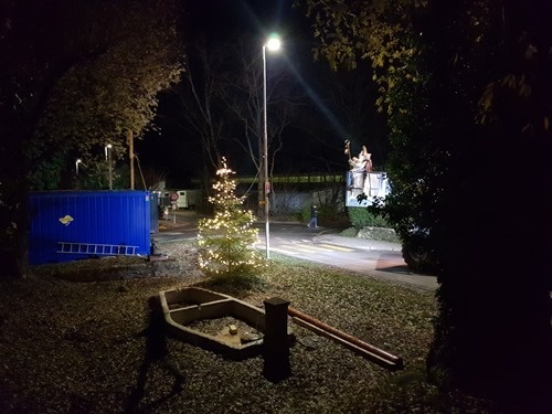 Here he comes... on a tractor