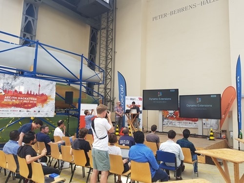 Michael and Keith talking Dynamo at the AEC Hackathon in Berlin