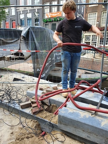 Max pulling the conduit through