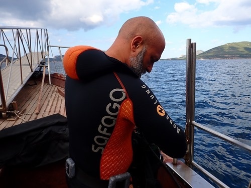 Getting suited up on the boat