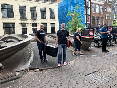 Kean and Josh carrying a server over the bridge