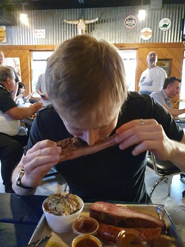 Tom tucking into BBQ